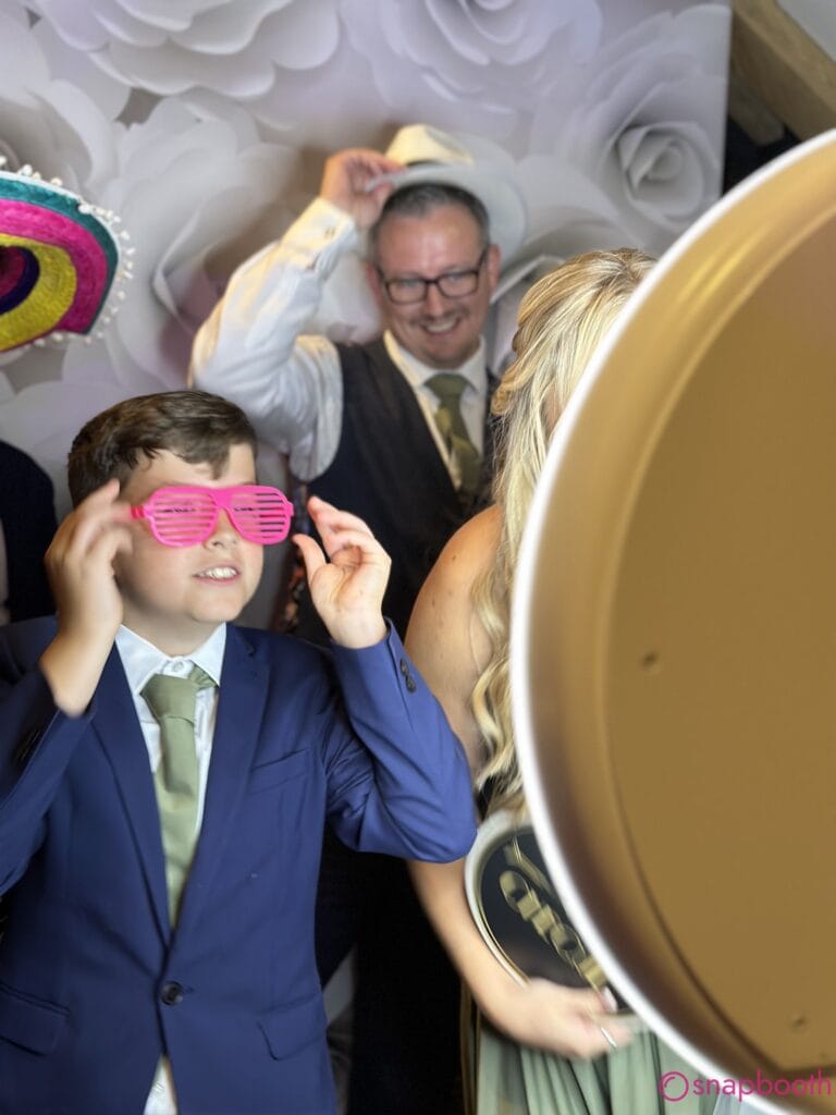 Fun photo booth props at a Witney wedding celebration