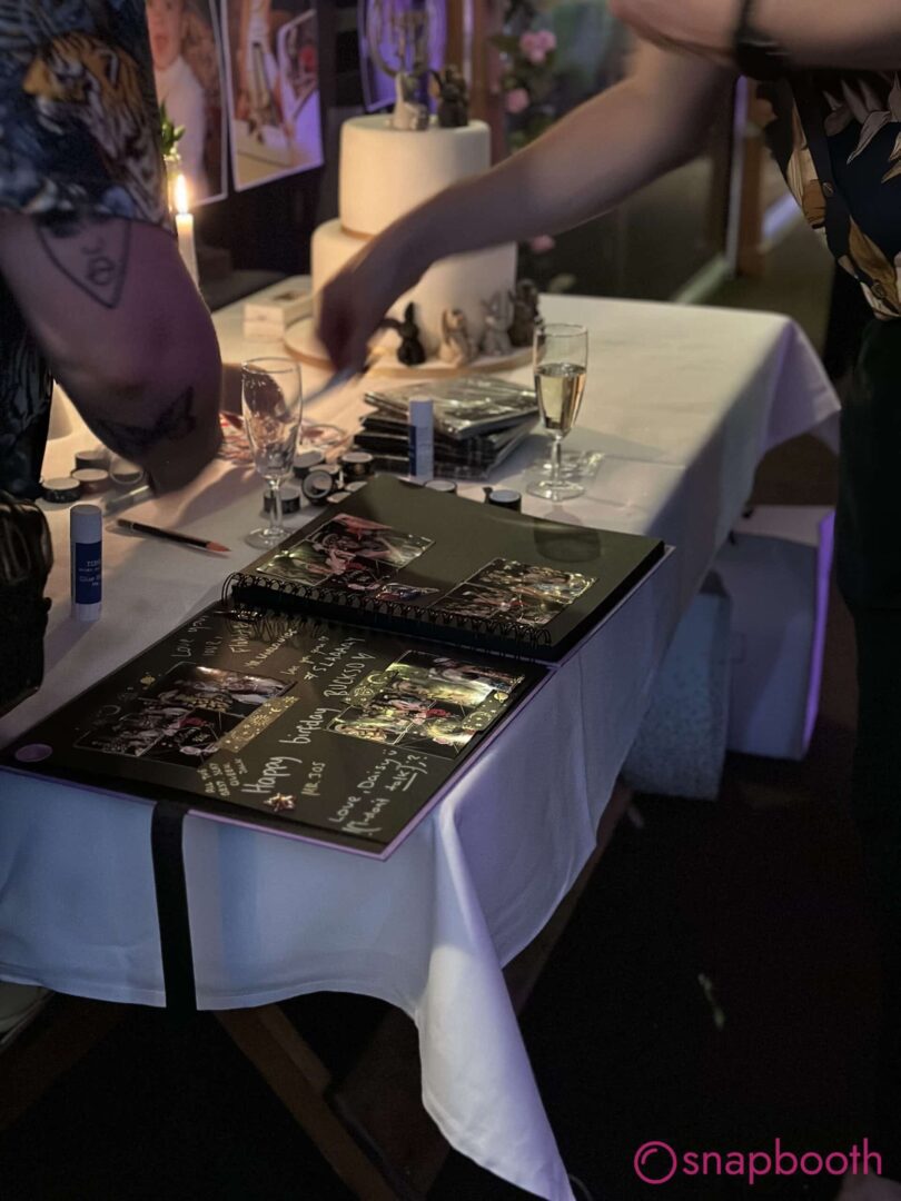 retro pod guest book, guests sticking in their photos