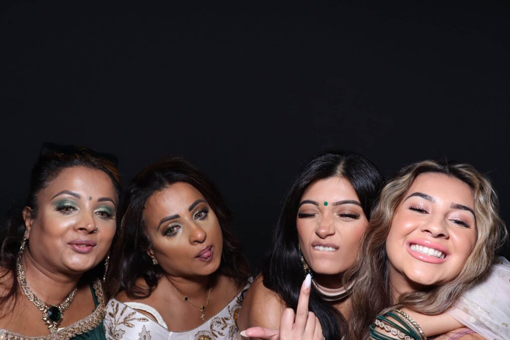 Photo booth hire Potters Bar - wedding guests enjoying premium photo booth experience