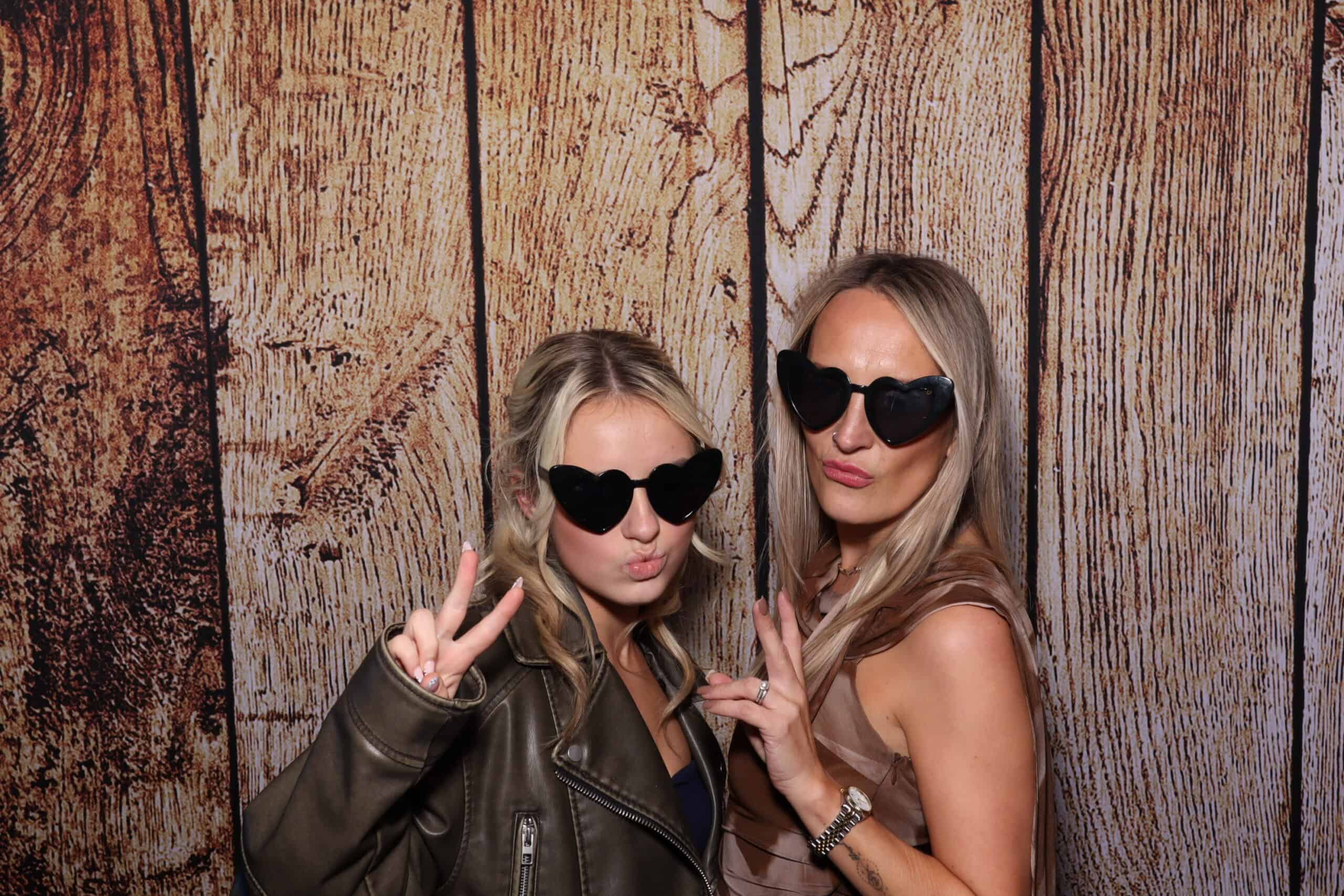 New Year's Eve photo booth hire - friends wearing novelty glasses and party hats